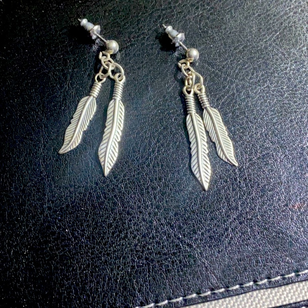 Sterling silver feather dangle earrings